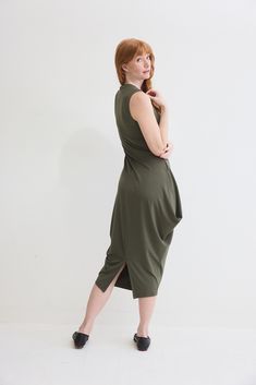 Turn heads in this chic sleeveless dress and its flattering silhouette. Pair with your favorite heels or dress down with casual sneakers Modern Stretch Sleeveless Dress, Modern Sleeveless Stretch Dress, Chic Sleeveless Asymmetrical Dress For Work, Spring Knee-length Stretch Asymmetrical Dress, Chic Sleeveless Maxi Dress For Work, Spring Knee-length Asymmetrical Stretch Dress, Summer Knee-length Asymmetrical Stretch Dress, Spring Asymmetrical Knee-length Stretch Dress, Sleeveless Stretch Asymmetrical Spring Dress