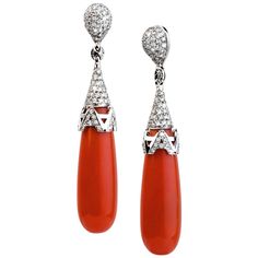 Earrings White Gold with Diamonds and Red Coral from Mediterranean Sea. The "A" Collection Angeletti is Designed and Manufactured in Rome. The Top Crown with Letters A Rotates Thanks to Careful Handmade Ring of Diamonds. The Stunning Drops of Coral are a Symbol of Percfection from Mediterranean Sea; the Coral Weight is 21 Grams and the Size is mm. h.34 l.10. Total Diamonds for Pave and Letters are ct. 2.26. The weight of 18kt Gold is grams 9.8. Angeletti Boasts an Exceptional History Made of Pure Jewelry Tradition, a Blend of History and Modernity. Flagship store established in Piazza di Spagna / Via Condotti Area Since 1940. For the complete Angeletti collection on 1stDibs, please visit our Angeletti storefront. White Gold Drop Earrings, Yellow Gold Drop Earrings, Earrings White Gold, 21 Grams, Ring Rosegold, Pearl And Diamond Earrings, White Gold Earrings, Earrings White, Mediterranean Sea