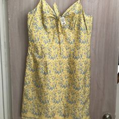 Ann Taylor Loft Dress. Brand New, Never Worn. 100% Cotton With 100% Cotton Lining. Yellow And Blue Floral Print. Side Zip. A Summer Must Have . Yellow Cotton Mini Dress For Spring, Yellow Cotton Mini Dress For Daywear, Crossback Dress, Burgundy Sweater Dress, Vintage 90s Dress, Mock Wrap Dress, Black White Maxi Dress, Flowy Summer Dresses, Simple Black Dress