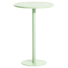 a white table with a round base on it's side, in front of a white background