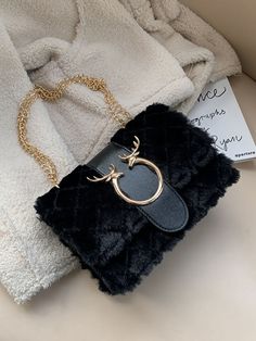 Material: FluffStyle: CasualElement: FluffType: ChainCapacity: 7.9"L x 3.1"W x 5.9"H Trendy Black Winter Shoulder Bag, Black Winter Crossbody Shoulder Bag, Fall Shoulder Bag With Chain Strap, Chic Evening Shoulder Bag For Winter, Trendy Evening Phone Bag With Chain Strap, Trendy Shoulder Bag For Party In Fall, Trendy Fall Fashion Accessory Bags, Trendy Fall Season Bags, Trendy Evening Shoulder Bag For Winter