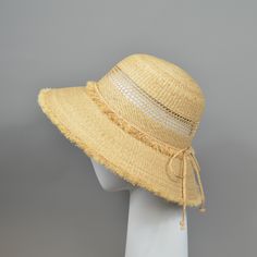 Such a cute summer hat in retro look! Perfect for the holiday but also for a relaxed look in the city. Made of raffia straw braids, finely woven. High quality. Bucket hat with large brim and frayed edges. Only in natural straw colour available. Self-adjustable band inside for the size. Fits sizes between 55 and 59 cm. Brim length: 10 cm All of my hats are handmade, using high-quality millinery standards. Every style can be made to customers' requests (size, colour), as long as it is possible. Pl Summer Panama Hat With Short Brim For Picnic, Summer Panama Hat With Short Brim For Picnics, Straw Panama Hat For Beach Season Picnics, Woven Toquilla Straw Hat For Summer, Summer Woven Boater Hat With Short Brim, Adjustable Summer Straw Hat For Picnic, Beige Woven Straw Hat With Curved Brim, Beige Summer Boater Hat For Picnic, Natural Short Brim Boater Hat For Picnics