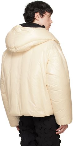 Down-filled polyester taffeta jacket. · Bungee-style drawstring at hood · Stand collar · Two-way zip closure · Embroidered detailing at front · Zip pockets · Concealed bungee-style drawstring at hem · Elasticized cuffs · Welt pocket and patch pockets at interior · Full fleece and taffeta lining Supplier color: Cream Fill: 100% goose down. Beige Nylon Outerwear With Drawstring Hood, Cream Nylon Hooded Outerwear, Cream Hooded Nylon Outerwear, Cream Nylon Outerwear For Spring, Spring Cream Nylon Outerwear, White Hooded Nylon Parka, White Nylon Outerwear With Detachable Hood, White Nylon Puffer Jacket With Double-lined Hood, Cream Nylon Outerwear For Outdoor