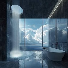 a large bathtub sitting in the middle of a bathroom next to a shower head