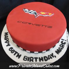 a red and white birthday cake with the name corvette on it's front side