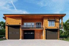 a two story house with three garages on the front and one above the garage