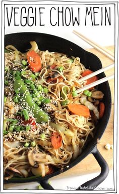 vegetable chow mein in a skillet with chopsticks on the side and text overlay that reads, veggie chow