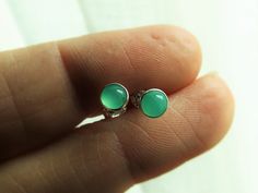 "Small tiny post green chrysoprase earrings made with .925 sterling silver, pure silver, and 4mm smooth gemstones. These go great with other earrings like hoops and studs! These even make great second hole earrings. Sleek simple statement that goes with just a bout everything for any occasion. The pictured finish is bright polished. Gemstone measures 4mm. This stone is mined exclusively in Australia. Some stones may have inclusions! If you would like you can pick your gemstones. ★ IMPORTANT SHIP Tiny Green Earrings For Gift, Small Green Earrings For Gift, Second Hole Earrings, Silver Jewelry Box, Earrings Green, Earrings Minimalist, Small Earrings, Minimalist Earrings, Sterling Earrings