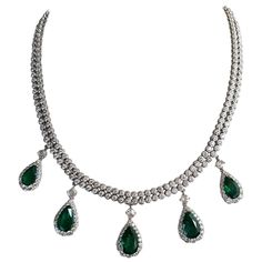 An extremely elegant pear shape Zambian Emeralds and Diamond necklace, all set in 18K white gold. Matching earring and ring can be made to order. Stone Details: Stone: Zambian Emerald Shape: Pear Weight: 16.74 carats Diamond Details: Weight: 20.33 carats Quality: VS / H,I 18K Gold weight: 51.2 grams The necklace can be certified upon request. A link to a video of this necklace is available upon request. 1stdibs Jewelry, Emerald And Diamond Necklace, Zambian Emerald, Lovely Jewellery, Gorgeous Jewelry, Zambia, Drop Necklace, Emerald Diamond, Exquisite Jewelry