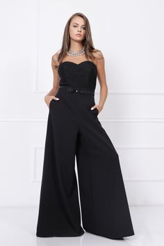 "Elevate your style with this designer black formal jumpsuit. The unique cold-shoulder design adds a touch of elegance to the classic jumpsuit silhouette. Made from a lightweight fabric, it's perfect for formal events and special occasions where you want to make a statement without sacrificing comfort. The high-waisted design enhances your figure while providing a flowy and stylish look. Key Features: 🖤 Cold-Shoulder Design 💃 High-Waisted Silhouette ✨ Flowy and Stylish 🌟 Ideal for Formal Occa Glamorous Black Formal Jumpsuits And Rompers, Glamorous Black Jumpsuits And Rompers For Formal Occasions, Elegant High-waist Party Jumpsuits And Rompers, Elegant High-waisted Jumpsuit For Party, Elegant Black Jumpsuits And Rompers For Gala, Elegant High Waist Jumpsuit For Party, Elegant High Waist Jumpsuits And Rompers For Party, Chic High Waist Dress For Formal Occasions, Elegant Strapless Jumpsuits And Rompers For Party