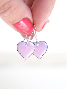 These beautiful pink heart earrings handmade with enamel on copper would make a lovely girl friend gift this Galentines day. The baby pink earrings measure approximately 13mm in diameter and are fired using pastel pink enamel which creates a subtle glazed finish. The copper earrings are backed with counter enamel to insure comfort and strength. They come complete with 925 Sterling silver earring wires. All jewellery comes packed in a quality iamrachel box, just add a bow and they're ready for gi Pink Hand Painted Heart Jewelry, Everyday Hand Painted Pink Earrings, Pink Heart-shaped Everyday Earrings, Pink Heart Earrings For Everyday, Pink Enamel Earrings For Gift, Pink Heart Earrings, Valentines Gift Guide, Necklace Length Guide, Galentines Day