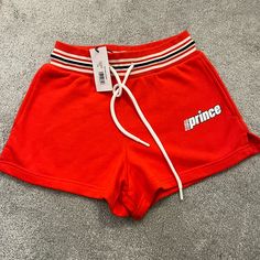 Red Athletic Shorts New With Tags Attached Xs Red Casual Shorts With Letter Print, Casual Red Shorts With Letter Print, Red Cotton Bottoms With Letter Print, Red Athleisure Shorts For Spring, Casual University Red Bottoms For Summer, Casual University Red Summer Bottoms, Casual University Red Shorts For Streetwear, Red Casual Streetwear Shorts, Tennis Whites