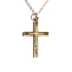 Vintage gold filled cross with stunning engraving on its yellow gold face. Swirls at the four ends of the cross compliment the milgrain detail across the face of the cross with added engraving at the base of the vertical timber. Strung on a new 14K gold filled flat cable chain. The beauty of this cross has endured many decades with minimal wear. Makes a uniquely special, Baptism, First Holy Communion or Confirmation gift! Era: Estimated to be made during past mid century. Measurements: Cross 29m Vintage Cross Necklace, Cross Gold, Engraved Cross, Cameo Pendant Necklace, Jewelry Cross, Christian Necklace, Gold Filled Necklace, Gold Face, Gold Cross Necklace