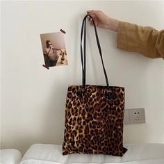 45448579580125 Portable Brown Tote Shoulder Bag, Brown Portable Tote Shoulder Bag, Trendy Brown Canvas Shoulder Bag, Trendy Rectangular Canvas Bag For Fall, Trendy Brown Portable Bucket Bag, Trendy Brown Canvas Bag For Errands, Brown Canvas Mobile Phone Bag, Brown Shoulder Bag With Animal Design For Daily Use, Brown Animal Design Shoulder Bag For Daily Use