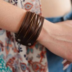 Boho Braided Leather Wide Wrap Adjustable Snap Cuff Bracelet Brown Unveil Your Inner Bohemian Spirit With This Braided Leather Cuff Bracelet That Comes With An Adjustable Clasp For A Perfect Fit. The Intricate Design Adds A Touch Of Elegance To Your Wrist, Making It A Versatile Piece That Can Be Worn On Various Occasions. The Adjustable Clasp Ensures That The Bracelet Stays Secure, Allowing You To Go About Your Day With Confidence. This Bracelet Is More Than Just An Accessory; It's A Statement Of Your Unique Style. 100% Leather Greaser Girl, Leather Cuff Bracelet, Boho Braids, Clothes Shopping, Leather Bracelets, Leather Cuffs Bracelet, Leather Cuffs, Braided Leather, Intricate Design