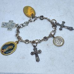 This Bracelet Is Upcycled and Features Assorted Crosses And Religious Icons In Silver. l This Is An Inspiring Bracelet And A Versatile Accessory For You  Or Your Special Someone.  The Length Is 7 1/2" FREE STANDARD SHIPPING WITHIN THE U.S Christian Bracelets, Religious Icons, Christian Jewelry, Cross Bracelet, Upcycled Jewelry, Religious Jewelry, Unique Charms, Chain Link Bracelet, Chain Link