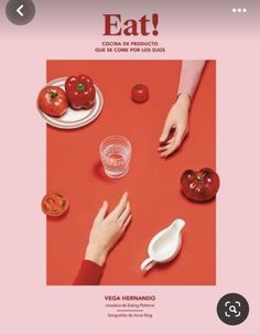 an image of someones hands on the table with tomatoes and other food items in front of them