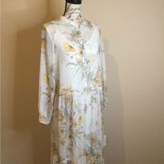 H&M Cream & Yellow Floral Print Maxi Dress With Full Separate Slip Lining Size 2 New Without Tags. Feminine Yellow Maxi Dress For Spring, Feminine Yellow Midi Dress For Daywear, Yellow Maxi Dress For Spring Daywear, Spring Yellow Maxi Dress For Daywear, Yellow Long Sleeve Dress For Daytime, Yellow Spring Maxi Dress For Daywear, H&m Spring Midi Dress For Daywear, H&m Spring Dress For Daywear, H&m Midi Dress For Spring Brunch