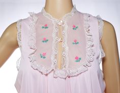 "Adorable 60s/70s pink night gown with lace trim and embroidered flowers. *Size = Large *Length = 53.5\" *Chest = 20\" *Hip = 24.5\" *Fabric = label is unreadable, but it is likely nylon. *Brand = JCPenney In good vintage condition, with the light wear you would expect from an item this age. As with all vintage items, please understand this has been previously loved and some wear may be present. I always do my best to accurately photograph and describe the item, but always purchase with the know Pink Night Gown, Angel Bunny, Long Nightgown, Fabric Labels, Women's Nightgowns, Nightgowns, Pretty Pastel, Pink Velvet, Perfectly Imperfect