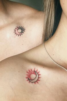 two sun and moon tattoo designs on the chest, one with red ink in it