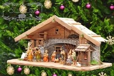 a nativity scene with figurines in the foreground