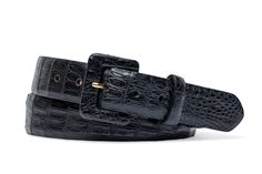 The refined stylings of our Caiman crocodile belt make for a sophisticated style statement. Unique patterns with subtle variations only add character. Designed with a crocodile covered square buckle that can be interchanged to a gold or silver buckle. Smooth nubuck leather lining. 1-1/2" wide.  Genuine Caiman crocodile belt with a crocodile covered square buckle Convenient snaps to change the buckle Made in America Caiman Crocodile, Crocodile Belt, Alligator Belt, American Alligator, Golf Belt, Custom Belt, Woven Belt, Style Statement, Nubuck Leather