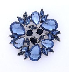 Beautiful rhinestone dark blue brooch bridal jewelry embellishment, which can be used for your DIY project - navy blue wedding bridal brooch bouquet, necklace, bracelet, ring pillow, invitations, cake decorations, event decor, crafts, scrap booking, jewelry gift and much more! Size: 2 inch high 2 inches wide Stone color: Ink blue, midnight blue and navy blue Metal: silver plated This midnight blue crystal brooch can be ordered with pin in the back to wire into brooch bouquet, add to wedding gown Blue Brooch, Cheap Diamond Rings, Bridal Jewelry Vintage, Navy Blue Wedding, Wedding Brooch, Diamond Brooch, Crystal Brooch, Blue Jewelry, Rhinestone Jewelry