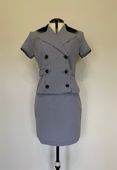 "Awesome vintage two piece top and skirt set with classic 90's black and white plaid pattern. Both pieces in excellent clean, like new, condition. Top has wrap and button closure down front with short sleeves. Skirt is high waisted and shorter in length. Made in USA. Measurements (taken zipped or buttoned up and laid comfortably flat) x 2 for total circumference (inches) *Top* Tag Size 9/10 Shoulder 16.25\"(seam to seam) Shoulder circumference up to 38\" Bust 38\" Waist 32\" Total Length 21\" Sl Classic Fitted Short Sleeve Sets, Retro Fitted Cotton Sets, Fitted Gingham Cotton Sets, Vintage Fitted Short Sleeve Sets, Tartan Outfit, Two Piece Top And Skirt, Levis Jeans High Waisted, Levis Mom Jeans, Plaid Outfit