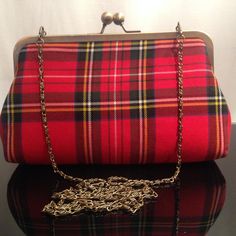 A beautiful and stylish clutch that will turn any simple outfit into a statement! HANDMADE IN SCOTLAND Size: 24cm - 9.5" / 15cm - 6" Chain: 58cm - 23" Red Clutch Evening Bag, Red Clutch Evening Bag With Chain Strap, Red Evening Clutch With Chain Strap, Chic Red Clutch For Evening, Chic Red Evening Clutch, Classic Red Bag For Party, Classic Red Evening Bag, Red Clutch With Chain Strap For Everyday Use, Classic Red Party Bag