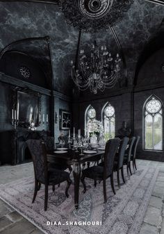 an ornate dining room with chandelier and black walls is featured in this image