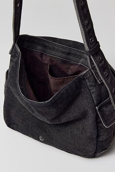 Essential messenger bag crafted from premium BDG denim. Low-profile silhouette with a pocketed flap closure. Lined interior with two pockets and plenty of space for your essentials. Complete with a zip pocket at the back for easy access, plus a water bottle pocket at the side. Finished with an adjustable strap - wear it on your shoulder or crossbody. Urban Outfitters exclusive. Features BDG denim messenger bag Washed soft denim with tons of storage Plenty of pockets inside and out Water bottle p Alt Messenger Bag, Cute School Messenger Bags, Messenger Tote Bag, Chic Cheap Faux Leather Hobo Bag, Dark Wash Shoulder Bag With Pockets For Everyday Use, Everyday Dark Wash Shoulder Bag With Pockets, 2000s Messenger Bag, Messenger Bag For School, Black Denim Travel Shoulder Bag