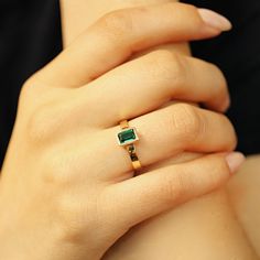 "This beautiful Emerald Gold Ring was handmade in Melt'm Jewelry Design Studio in California using 14k solid yellow gold band and 6x4mm emerald cut lab grown emerald stone.  Emerald is featuring in 14k gold thick bezel setting. It's a lovely unisex ring for men and women.   DETAILS ABOUT THE RING, MATERIAL AND STONES Ring Band: 14K solid gold  Ring Band size:  3x1 mm thick flat band Gemstone: Lab grown Emerald Emerald size:   6mm x 4mm  emerald cut Yellow gold or white gold options available fro Emerald Ring For Women, Emerald Cut Yellow Gold Ring As A Gift, Stone Ring Design Gold For Women, Modern Gold Rings With May Birthstone, Panna Ring Design In Gold, Gold Emerald Cut Stackable Birthstone Ring, Gold Stackable Birthstone Ring With Emerald Cut, Stackable Gold Emerald Cut Rings, Emerald Cut Gold Birthstone Ring Stamped 14k