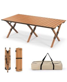 a wooden table with two folding chairs and a bag