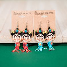 The Dancing Frida Kahlo beaded earring will elevate your outfit with fun and flare!Hand-beaded in Guatemala. Sold in assorted colors, email us at customerservice@luciasimports.com with any preferences. Elevate Your Outfit, Beaded Earring, Clothing Blogs, Garden Journal, Novelty Items, Your Outfit, Hand Beading, Guatemala, Beaded Earrings