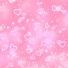 pink and white hearts wallpaper with sparkles in the air on a pink background