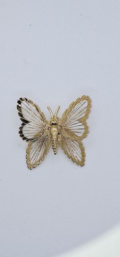 This is a beautiful Monet open winged gold tone wire filigree butterfly pin. This would make a great addition to any collection! Measures: 2.5" Every order comes in a beautiful gift bag. Gold Butterfly Brooches For Gift, Gold Butterfly Brooches For Collectors, Gold Butterfly Brooch As Gift, Gold Butterfly Brooch Gift, Gold Butterfly Brooch For Gift, Gold Butterfly Brooch For Formal Occasions, Wire Filigree, Butterfly Pin, Robins