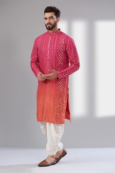 Hot pink long sleeves ombre effect kurta in silk base with intricate mirror work.  Components: 1 Pattern: Embroidery Type Of Work: Mirror Work Neckline: Mandarin Collar Sleeve Type: Long Sleeves Fabric: Silk, Lining: Cotton Color: Pink Other Details:  Attached cotton lining Side slits Note: The dhoti pant worn by the model is not for sale Occasion: Mehendi and Puja, Sangeet - Aza Fashions Haldi Ceremony Outfit For Men, India Fashion Men, Embroidery Mirror Work, Haldi Ceremony Outfit, Wedding Kurta For Men, Mehendi Outfit, Embroidery Mirror, Haldi Outfits, Wedding Dresses Men Indian