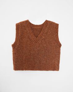 a brown sweater vest on a white background