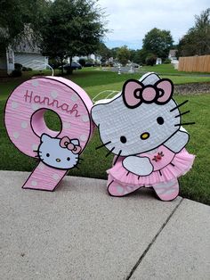 a hello kitty birthday decoration with the number 9 on it's front and bottom