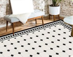 a white and black rug in a living room