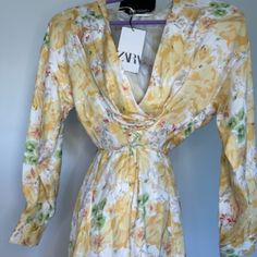 Yellow Floral Summer Silk Mini Dress With Draw String. Never Worn. Tag Is Still On. Runs Very Small. Yellow Long Sleeve Maxi Dress For Spring, Elegant Yellow Floral Summer Dress, Yellow Floral Print Midi Dress, Yellow Floral Print Dress For Spring, Yellow Floral Print Spring Dress, Yellow Floral Dress For Spring, Spring Yellow Floral Print Dress, Yellow Floral Dress For Spring And Summer, Mustard Floral Print Mini Dress