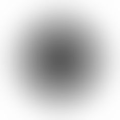 a black and white image of a circular object with no light on it's surface