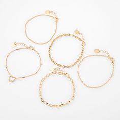 Complete your look of the day with this bracelet set! This mixed set includes 5 different gold-tone chain bracelets to create the perfect arm party. Finish: Gold-tone Length: 6" Closure: Lobster clasp Pack Size: 5 Material: Metal - Claire's Gold Mixed Chain Bracelets - 5 Pack Bracelet Pack, Jewelry Bracelets Gold, Look Of The Day, Arm Party, Chain Bracelets, Fashionable Jewelry, Simple Bracelets, Jewelry And Accessories, Girls Jewelry