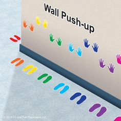 there are many different colored hands on the wall push - up sign, which is next to each other