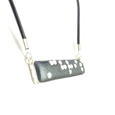 This awesome personalized pendant necklace has the braille translation of the Your Name or any other 6 letter, or less, word. The pendant is made of polymer clay pressed into a silver-plated cabochon type pendant blank and has black metal dots that are raised, smooth and easy to read.  The piece is glazed for shine and protection.  Size: 2 inches long by 1/2 inch wide (50mm x 13mm) Includes a choice of chain/cord Please Note: * I will use a capital letter dot at the beginning of names if it will Braille Necklace, Personalized Pendant Necklace, Personalized Pendant, Grade 2, Some Words, Personalized Necklace, Necklace Pendant, Black Metal, Your Name