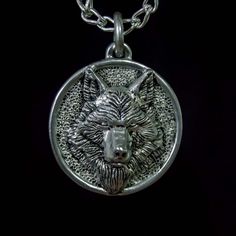 Here is a very detailed and realistic wolf's head and face motif on a round thick pendant base, handmade from the best materials and cast as a single piece of metal, so no gluing or welding, assuring lasting durability. This necklace is a perfect gift for any person who is into nature, and wolves specifically, shamans, polytheists and pagans, also witches and warlocks of any gender. Surprise them with this awesome and powerful symbol and watch them smile in delight, or treat yourself to one. All Viking Style Silver Wolf Design Jewelry, Viking Style Silver Jewelry With Wolf Design, Viking Style Wolf Design Jewelry Gift, Wolf Medallion, Gender Surprise, Metal Wolf, Creature Sculpture, Viking Mythology, Inverted Cross