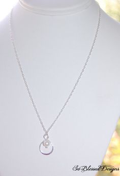 Mother of the Groom necklace, Pearl Infinity necklace and chain, sterling silver, wedding jewelry, Thank you gift to Mom This listing is for a beautiful sterling silver infinity and a white freshwater pearl necklace with a special message card inside the box. The pendant is about the size of a dime. Perfect for your mother or future mother in law to wear on the big day and for everyday wear too. This necklace is the perfect symbol of eternal love. The pendant you receive will be similar to the o Delicate White Sterling Silver Necklace, Wedding Charm Necklace With Adjustable Chain And Round Pendant, Anniversary Sterling Silver Charm Necklace With Silver Chain, Anniversary Sterling Silver Necklace With Adjustable Chain, Delicate Sterling Silver Bridal Necklace As Gift, Minimalist Silver Pearl Necklace For Anniversary, Minimalist Silver Chain Jewelry For Wedding, Silver Charm Necklaces With Adjustable Chain For Weddings, Wedding Charm Pendant Necklace With Adjustable Chain