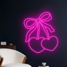 a neon pink teddy bear with a bow on it's back wall decal