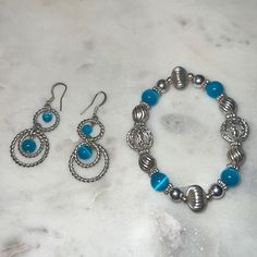 Turquoise Blue Beaded Bracelet & Dangle Earrings Silver Women’s Fashion Jewelry Adjustable Blue Jewelry With Silver Beads, Blue Metal Jewelry With Dangling Beads, Silver Jewelry Sets With Round Beads, Nickel-free Light Blue Round Bead Jewelry, Silver Beaded Dangle Jewelry Sets, Adjustable Silver Beaded Jewelry Sets, Nickel Free Blue Jewelry Sets, Adjustable Blue Bracelets With Dangling Beads, Adjustable Beaded Blue Jewelry Set