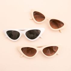 Cat eye bachelorette party sunglasses make a chic bachelorette party favor for your bridesmaids! You can use them as a photo prop for some unique shots in the pool or at the beach. Each pair of cat eye-shaped sunglasses comes in your choice of white or beige. Material: Acrylic. UV400. Size: 5.75"L x 6"W x 1.75"H Cat Themed Bachelorette Party, Summer Bachelorette Party Outfit, Chic Bachelorette Party, Sunglasses Bachelorette Party, Bridal Party Sunglasses, Unique Shots, Chic Bachelorette, Bachelorette Party Items, Summer Bachelorette Party